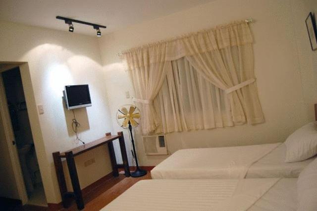 Ilocos Rosewell Hotel Quarto foto